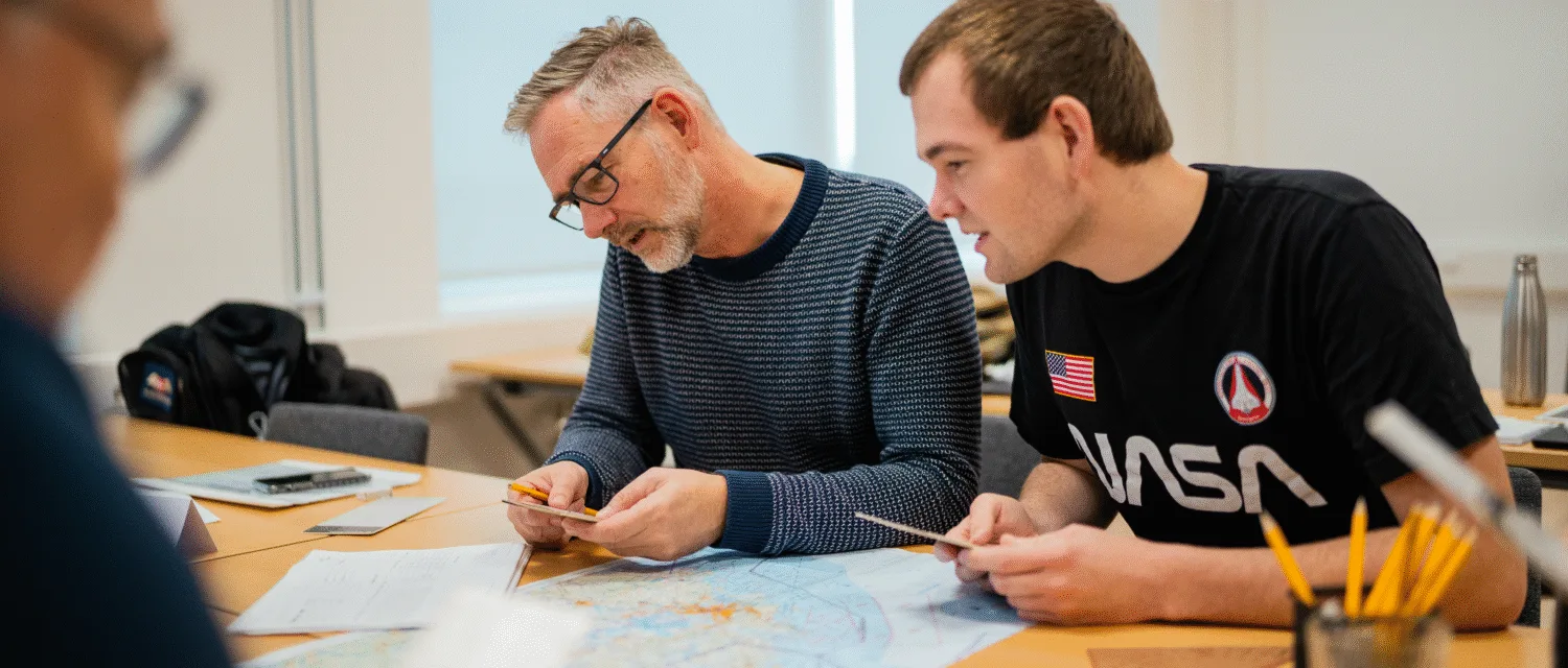 Bridging gaps in generations: A must-do for instructors and training professionals 1 students in classroom with map2